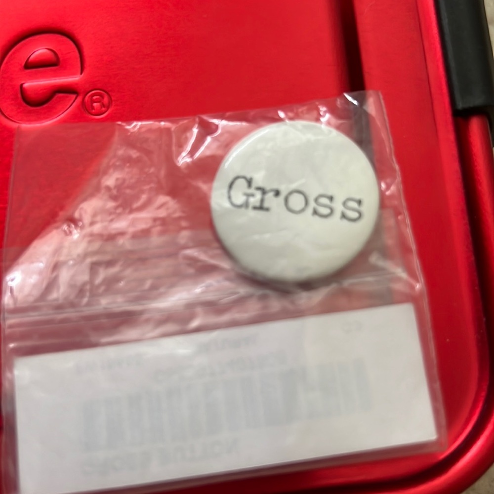 Supreme gross button